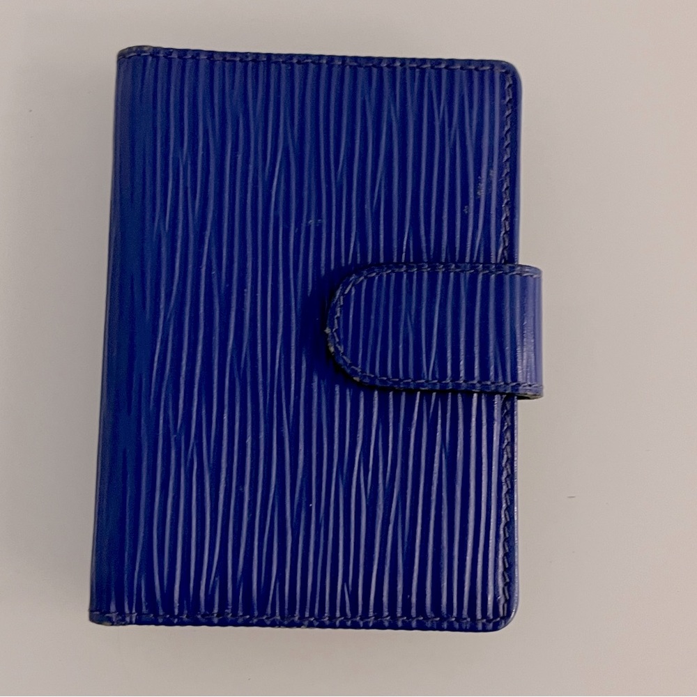 New cobalt blue small Epi leather wallet, same leather used for Louis Vuitton.